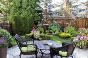 Madcow Tree Service—A beautifully landscaped backyard with trees and plants local to Florissant, MO.